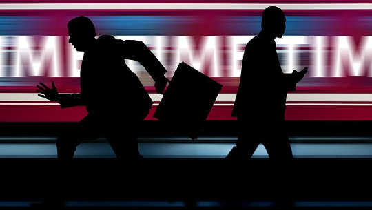 The Toxicity of Pursuing Being Number One two business men in silhouette running frantically in opposite directions